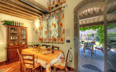 Accommodatie Montelopio 6: Keuken, Lunchroom, Woonkamer