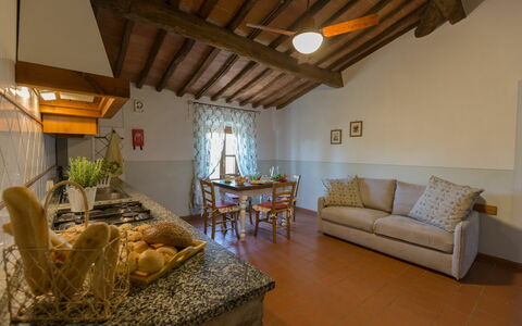 Accommodatie Montelopio 7: Keuken, Lunchroom, Woonkamer