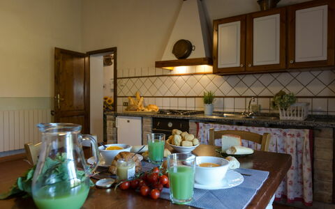 Accommodatie Montelopio 7: Keuken, Lunchroom, Woonkamer