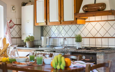 Accommodatie Montelopio 4: Keuken, Lunchroom, Woonkamer