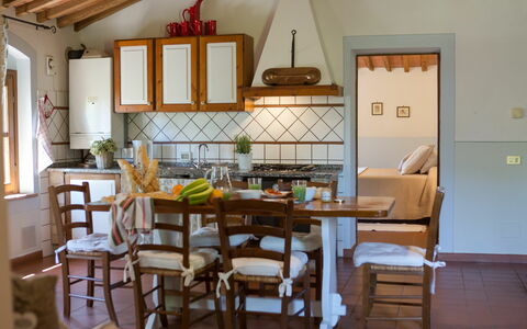 Accommodatie Montelopio 4: Keuken, Lunchroom, Woonkamer