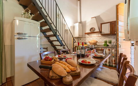 Accommodatie Montelopio 5: Keuken, Lunchroom, Woonkamer