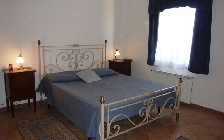 Accommodatie Cetona: slaapkamer