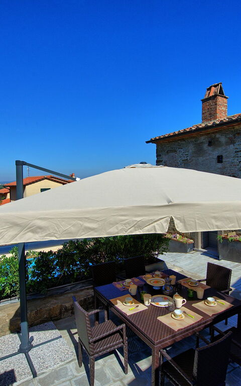 Casa La Fonte: Balkon / terras / patio, Tuin