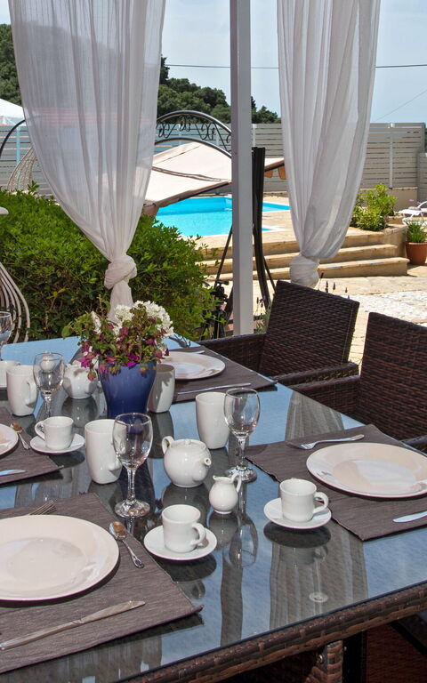 Villa Giador: Balkon / terras / patio, Buitenshuis