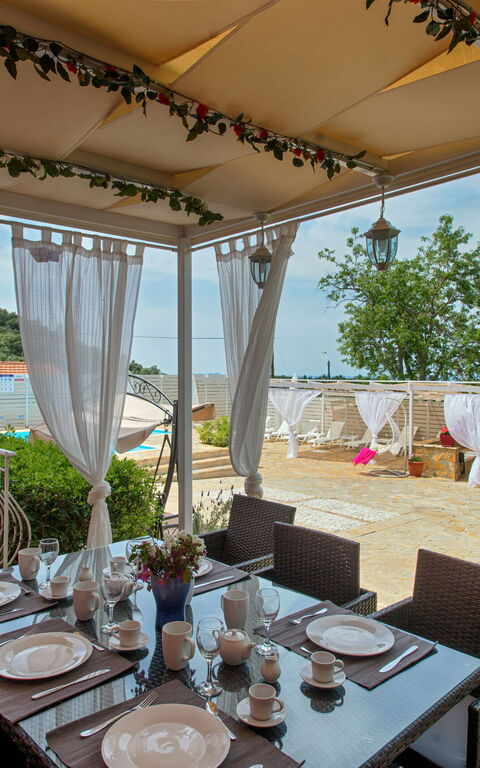 Villa Giador: Balkon / terras / patio, Buitenshuis