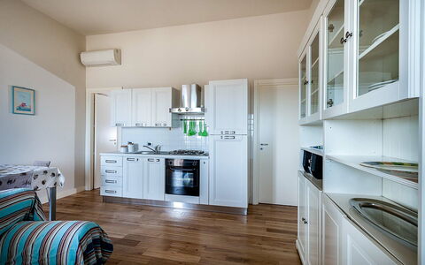 Accommodatie Timone: Keuken, Lunchroom, Woonkamer