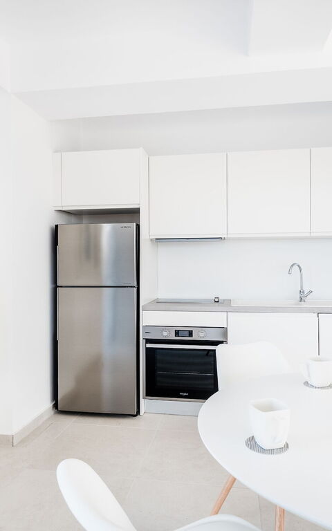 Villa Athena: Keuken, Lunchroom, Woonkamer