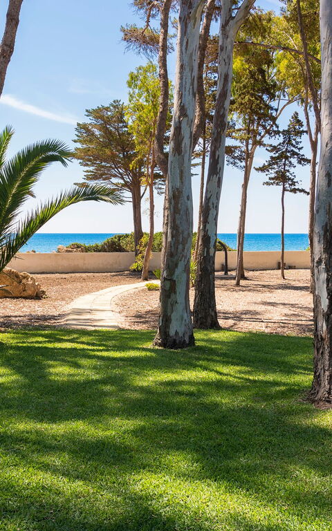 Marinella Punta Milocca: Buitenshuis, Tuin