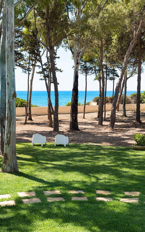 Marinella Punta Milocca: Buitenshuis, Tuin