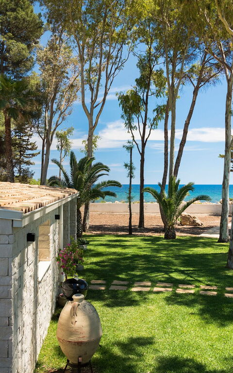 Marinella Punta Milocca: Buitenshuis, Tuin