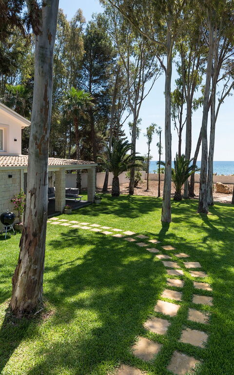 Marinella Punta Milocca: Buitenshuis, Tuin