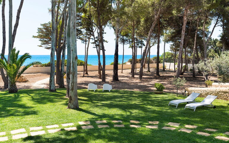 Marinella Punta Milocca: Buitenshuis, Tuin