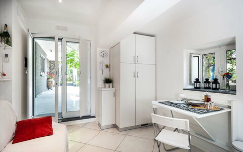 Accommodatie Conchiglia: Keuken, Lunchroom, Woonkamer