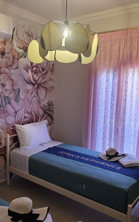 John Residence: slaapkamer