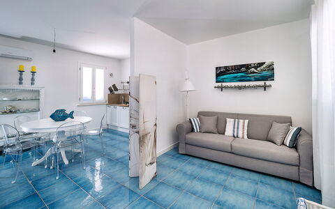 Accommodatie Riccio: Woonkamer