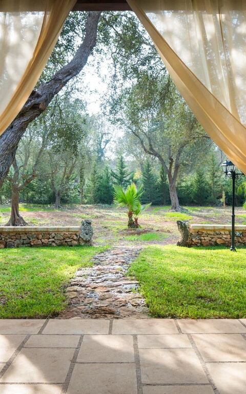 Villa Astrea: Balkon / terras / patio, Tuin