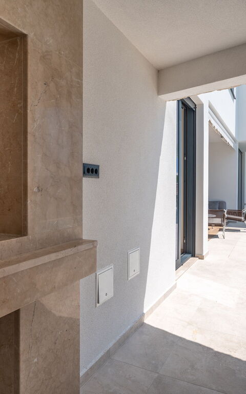 Villa Loma: Balkon / terras / patio, Buitenshuis