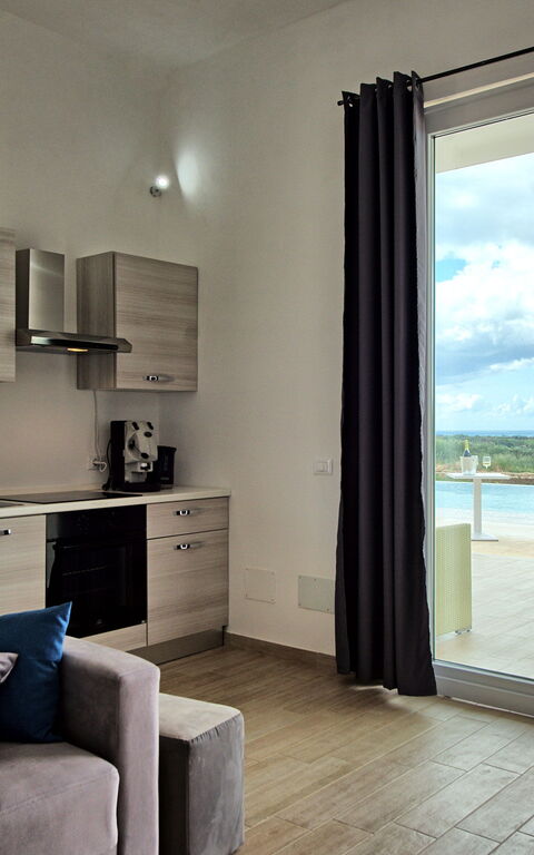 Villa Infinito: Keuken, Woonkamer