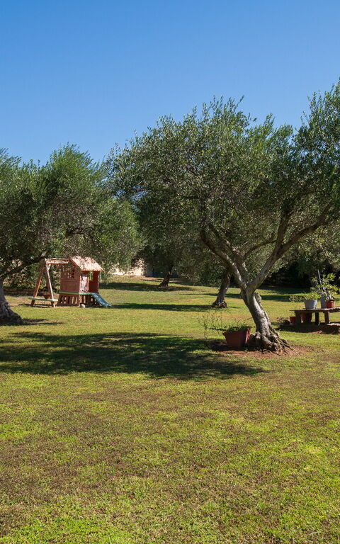Villa Melitti: Buitenkanten, Buitenshuis, Tuin