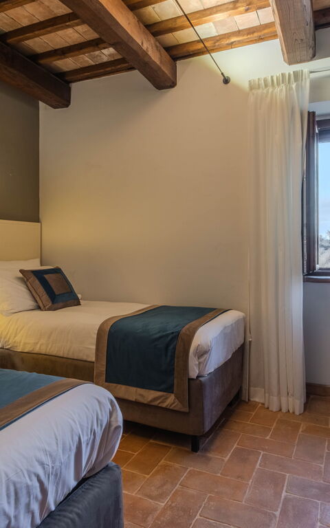 Tenuta Poggio Guiano: slaapkamer