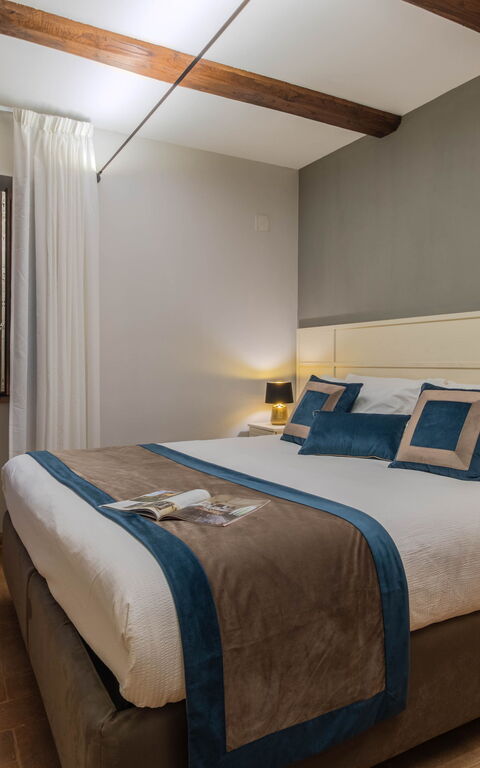 Tenuta Poggio Guiano: slaapkamer