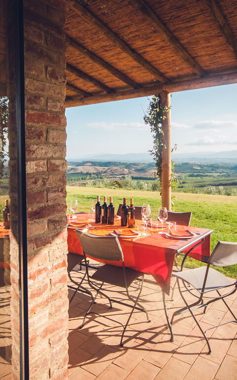 Villa Icario: Balkon / terras / patio, Keer bekeken, Tuin