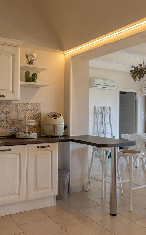 Villa Calanthia: Lunchroom, Woonkamer